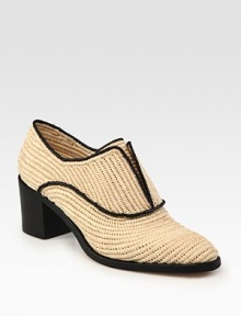 Timeless design updated by a woven raffia upper and stacked heel. Stacked heel, 2½ (65mm)Raffia upperLeather solePadded insoleMade in ItalyOUR FIT MODEL RECOMMENDS ordering true size. 