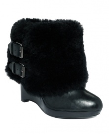 In the battle against winter, fight back with your fiercest fashion. The faux fur cuff and stacked wedge heel of the Arctic booties by Max Studios win every time.