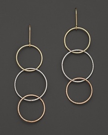 Interlocking tri-color hoop earrings in 14K gold evoke bohemian elegance. From Lana.