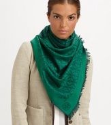 An ultra-cozy, jacquard wool scarf is embellished with logo pattern and eyelash fringe.Merino woolAbout 82 X 25Dry cleanImported