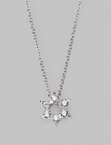 From the Tiny Treasures Collection. This petite diamond-encrusted star with an open center is set in 18k white gold and hangs from a sterling silver chain. Diamonds, 0.09 tcw 18k white gold and sterling silver Chain length, about 18 Pendant diameter, about ¼ Lobster clasp Made in Italy