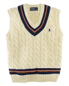 The essential sweater vest is rendered in handsome cabled cotton with preppy stripes.