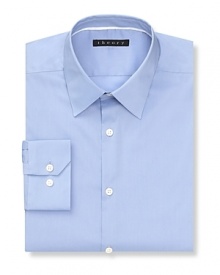 Solid dress shirt with spread collar, two button mitered cuffs. Modern fit through the body.