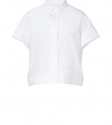 An ultra modern take on the classic shirt, Jil Sanders boxy white button-down is a characteristic and chic way to wear the brands iconic minimalist look - Small pointed collar, short sleeves, buttoned cuffs, button-down front - Cropped, boxy cut - Wear with high-waisted trousers and streamlined leather accessories