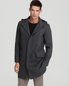 From the hood to the herringbone print, this long coat from Theory brings layers of depth to your style.