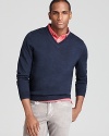 Sharpen your presentation with a handsome V-neck in premium merino wool, a luxe addition to your sweater drawer.