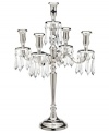 Rekindle the elegance of another era with the silver-plated candelabra from Lighting by Design. Faceted crystal beads adorn four curved arms and a center candlestick, creating instant drama in a living or dining room.