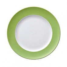 Sophisticated dinnerware with a rim of color to as vibrancy to the dinner table.