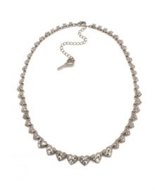 Have a heart. Every day is Valentine's Day with this romantic heart motif collar necklace from Betsey Johnson. Crafted in hematite tone mixed metal, it's adorned with sparkling crystal accents. Approximate length: 16 inches + 3-inch extender.