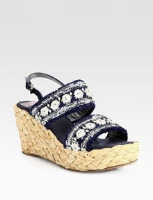 Bohemian-inspired wedge silhouette of textured raffia with glittery sequins, playful fringe trim and beaded details. Raffia wedge, 3½ (90mm)Raffia platform, 1½ (40mm)Compares to a 2 heel (50mm)Pleated raffia upper with sequins and beaded embellishmentsAdjustable leather slingback strapLeather lining and solePadded insoleImported