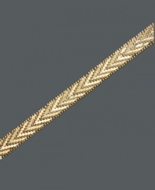 Adorn your wrists with the Midas touch. This spectacular bracelet has been crafted in bonded sterling silver and 14k gold featuring a Chevron Riccio design. Approximate length: 7-1/4 inches. Approximate width: 1/4 inch.