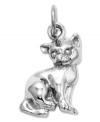 With a precocious look and cute tilt of the head, this cat charm embodies natural feline sensibility. Rendered here in 14k white gold. Chain not included. Approximate drop length: 4/5 inch. Approximate drop width: 2/5 inch.