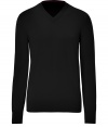 Load up on basic fall pieces like this classic black v-neck pullover - Made of pure wool for superior warmth and comfort through the seasons - Long, slender sleeves, small v-neck and moderately long hem - Looks great solo or as a layer piece - Try with dark denim and boots or with khakis and favorite trendy sneaks