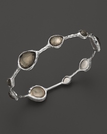 Faceted pyrite doubles dot a sterling silver bangle from Ippolita.