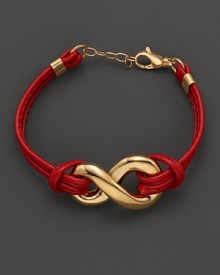 An elegant chain bracelet with an edgy appeal combing 18 Kt. gold and rich red leather.