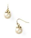 Carolee's pearl-drop earrings add a touch of sophistication, perfectly polished worn with a structured shift dress and classic pumps.