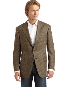 THE LOOKAllover tweed constructionNotched lapelWelt pocket at chestButton closureDual flap pocketsLong sleeves with button cuffsVented back hemInner welt pocketsTHE FITAbout 31 from shoulder to hemTHE MATERIALWorsted woolFully linedCARE & ORIGINDry cleanMade in USA