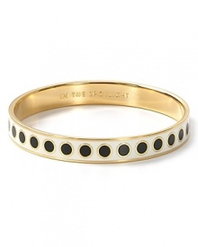 What's your mantra? This kate spade new york bangle spells it out with interior engraving; this one reads: IN THE SPOTLIGHT.