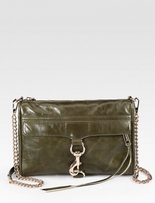 An easy shape in pebbled leather, featuring a removable chain and sleek, polished hardware.Detachable chain and leather shoulder strap, 22 dropTop zip closureOne outside zip pocket with flap and hook closureProtective metal feetOne inside zip pocketThree inside open pocketsCotton lining11W X 7½H X 2DImported