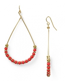 Give your look a hit of gypsy luxe with this pair of beaded teardrop hoop earrings from Vanessa Mooney. Crafted from gold plate with delicate beads, these earrings encapsulate breezy beauty.