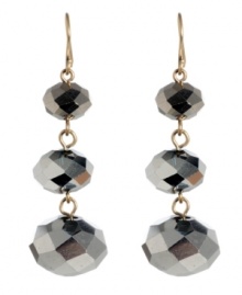 Raise the stakes by adding a little disco glamor. These Kenneth Cole New York drop earrings feature shimmering silver beads set in mixed metal. Approximate drop: 2 inches.