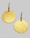 Richly textured discs of hammered 24k gold swing from graceful golden beads. 24k yellow gold Diameter, about 1 Ear wire Imported