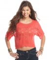 Add artisanal chic to your day or night ensemble with this cropped, open-knit sweater from It's Our Time!