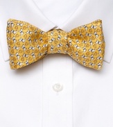 A classic touch to your dressed-up look, this handsome dog-print tie is crafted in quality Italian silk.