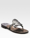 Essential thong with a metallic, snake-print leather upper and decorative stitching. Snake-print metallic leather upperLeather lining and soleImportedOUR FIT MODEL RECOMMENDS ordering true size. 