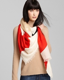 Take a big bow in kate spade new york's oversized scarf with a pretty, colorblocked bow print and fringed edges.