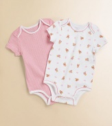 A pack of two adorable bodysuits rendered in ultra-soft printed cotton jersey.Envelope necklineShort sleevesBottom snapsPrinted tag to prevent skin irritationCottonMachine washImported Please note: Number of snaps may vary depending on size ordered. 