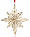 Star of wonder, star of light. Add a touch of delicate beauty to your tree with this stunning ornament complete with a lustrous Capiz shell base and shining gold frame. With red ribbon hanging thread.