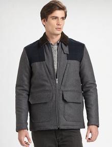 Made from fine Italian fabrication, this jacket offers a unique take on on-trend mixed media.Corduroy collarZipper frontOversized patch pocketsQuilted details on front and backAbout 30 from shoulder to hem70% wool/20% nylon/10% cashmere; cotton liningDry cleanImported of Italian fabric