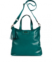 Elevate your everyday or off-duty look with this supple leather tote from cult-favorite accessory designer Anya Hindmarch - Large carryall shape, top zip closure with tassel detail, top carrying handles, convertible shoulder strap, small internal pockets, back zip pocket - Perfect for toting around your daily essentials, work, or stylish travel