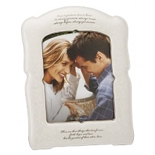 This romantic frame is inscribed with the poignant words from 1 Corinthians 13: Love is patient, love is kind. It always protects, always trusts, always hopes, always perseveres. There are three things that last forever: faith, hope and love. But the greatest of them all is love. The frame makes a memorable engagement, wedding or anniversary gift. Frame holds one 8x10 photo and is crafted of porcelain.Height: 14 1/2