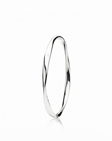 Subtle contours and liquid lines add an organic element to PANDORA's sterling silver bangle.