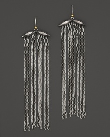 Silver and gold mingle with a dramatic fall of chains. By Gurhan.