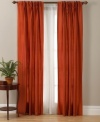 Woven from richly dyed faux silk, the Antique Faux Silk window collection dresses your window in classical elegance. Vertical pinch pleat detail at the top hides the generously sized rod pocket with back tabs, which accommodates thicker rods. Cotton lined.