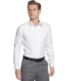 A time-honored classic. This vertical stripe long sleeve shirt by Calvin Klein should be a standard item in your closet.