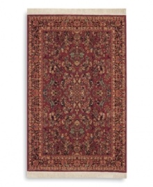 A long runner that is ideal for hallways and entryways. Richly detailed and deeply colored, the exotic floral motif of this rug made its debut in twentieth-century America and has remained a favorite. Individual skein-dyeing imparts a jewel-tone clarity to the rich red, green and ivory palette. A patented wash process creates a soft vintage finish faithful to the craftsmanship of the original. Woven in the USA of premium fully worsted New Zealand wool.