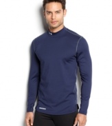 Under Armour® mock neck shirt is designed with Evo Coldgear® fabric that wicks moisture from the skin and circulates body heat keeping athletes warm, without weighing them down.