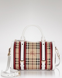 Signature logo print coated canvas gets a color block treatment with the addition of red, black and white leather accents. Convertible straps add the option of carrying in the hands or resting on the shoulder. From Burberry.