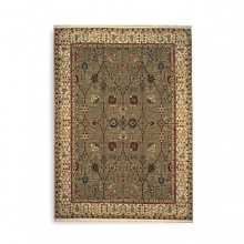 Modeled after the world's most prized antique textiles, this luxuriant Karastan rug lends opulence and heirloom beauty to your home. Surrounded by a light border to add depth and contrast, the stylized pattern depicts lush flora and curvilinear accents. First introduced in 1928, the Original Karastan Collection established the highest standard for traditional Oriental machine woven rugs.