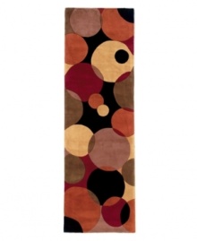 A runner to brighten any hallway. Abstract and absorbing, this rug features a multi-circle pattern in lavender, terra cotta, black, peach and burgundy. Reminiscent of modern art paintings, it adds striking modernity and grace to your home. Hand-tufted and hand-carved of plush wool.