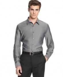 Trim down your polished wardrobe style with this slim fit shirt from Calvin Klein.