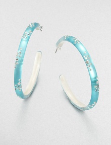 From the Lucite Wanderlust Collection. Slender hoops of hand-painted, hand-sculpted Lucite, sprinkled with the shimmer of Swarovski crystals.CrystalLuciteDiameter, about 2Post backMade in USA