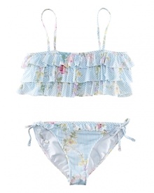 A flurry of ruffles adorn this charming two-piece swimsuit, featuring a pretty print of stripes and flowers and adjustable side ties for the perfect fit.