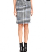 Add graphic verve to your look with a chic, houndstooth-check pencil skirt from MICHAEL Michael Kors. A faux-leather buckle at the waist means you're already perfectly accessorized.