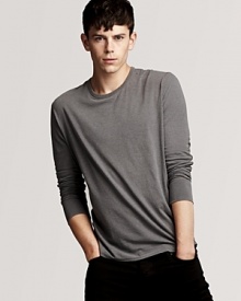 Burberry accents this sleek tee with check-print elbow patches.