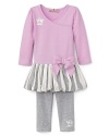 Juicy Couture brings you a sweet set: the top is accented with a bow and pleated bubble hem, while silver crown logos shine on the top and the gray leggings.